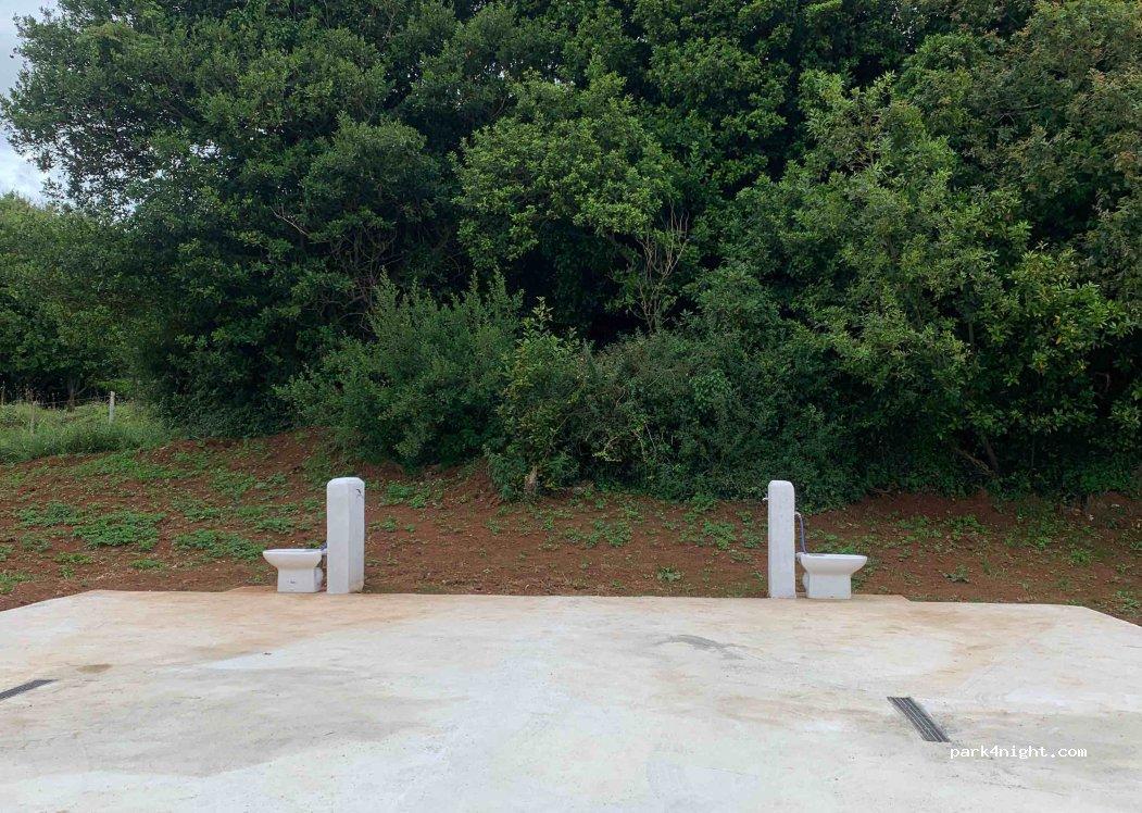 Área de Autocaravanas Comillas Cogiendo Aire